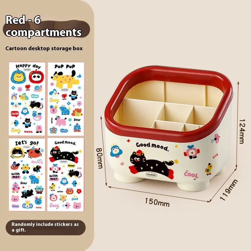 Cartoon-style plastic desktop organiser with grid compartments and red or brown stickers.