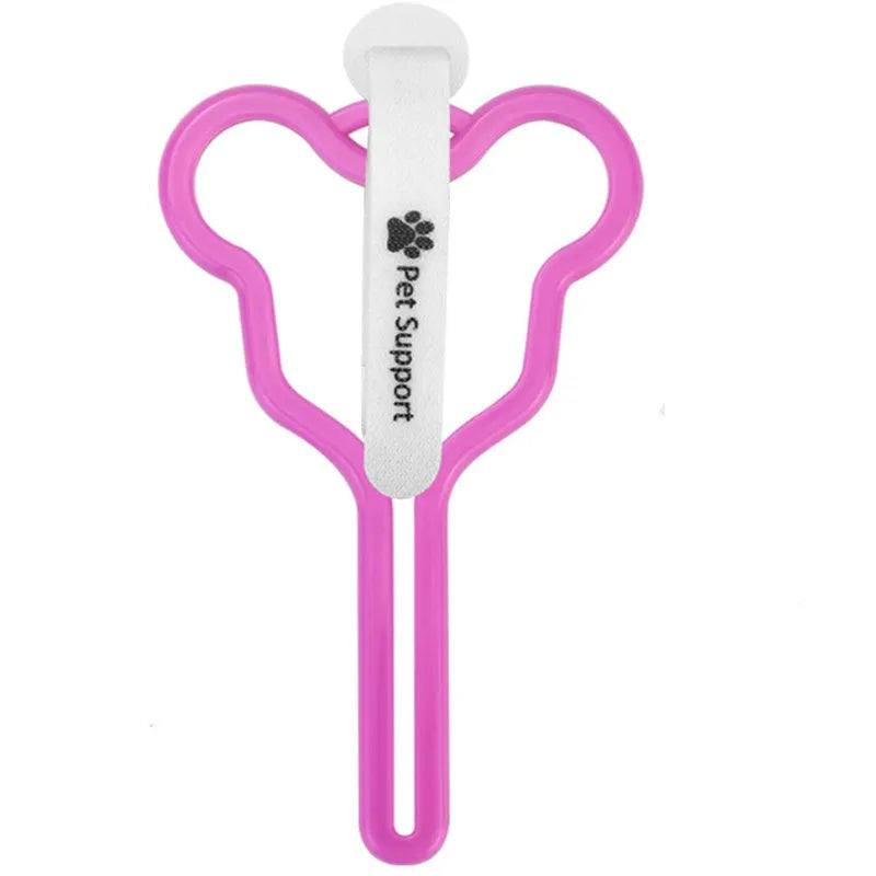 A hands-free dog poop bag holder with a hook and loop fastener strap, shown attached to a dog leash.