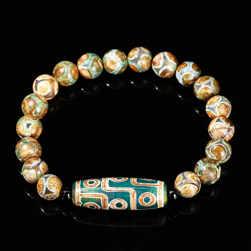 Handmade dzi bead bracelet with 8mm barrel beads in green, unisex geometric design.