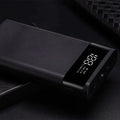 Digital display power bank spring kit with plastic shell and multi-U charging ports