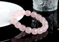 Pink natural bamboo crystal barrel bead bracelet with 11x12mm beads and geometric design.