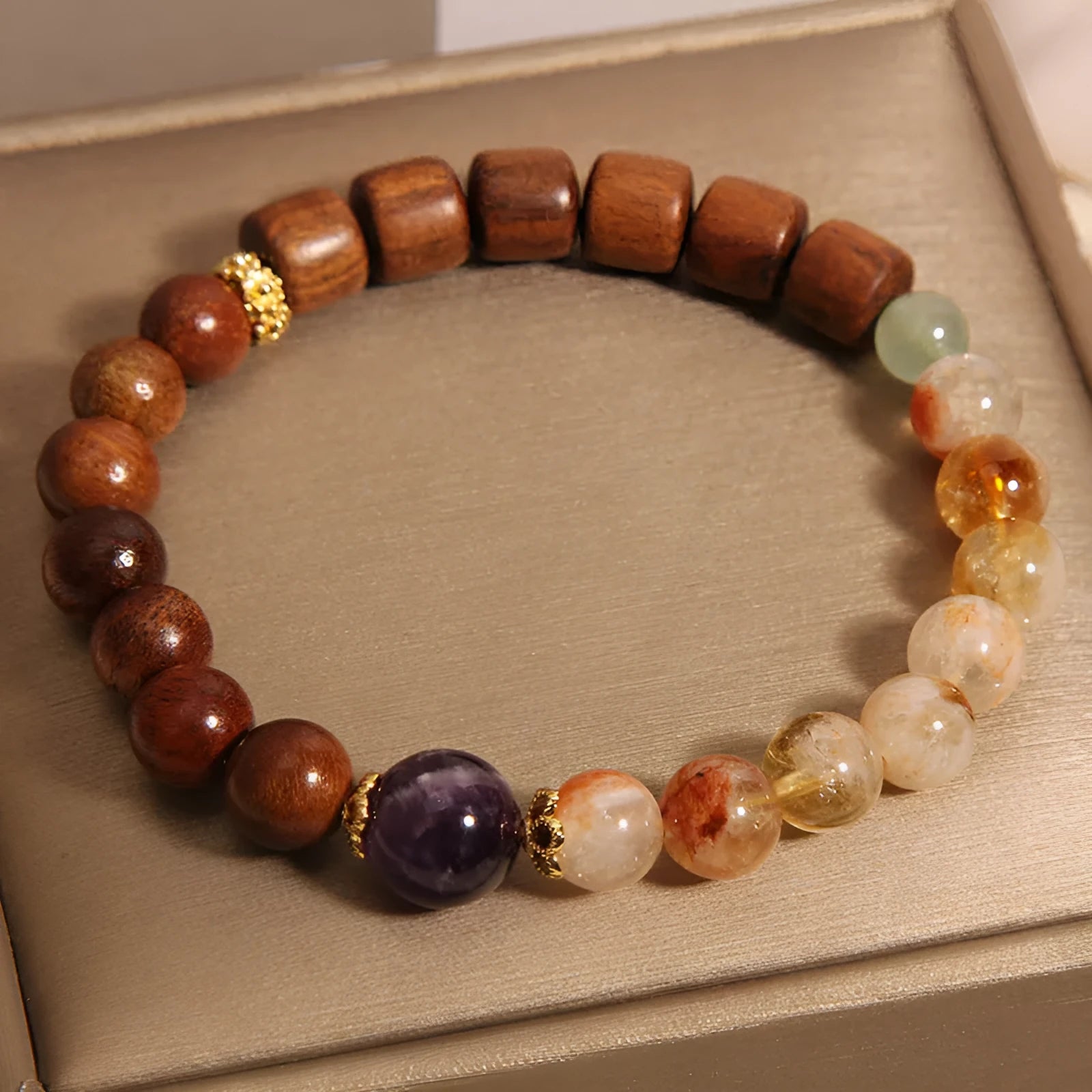 Yellow tower crystal and ebony amethyst women's bracelet with rhinestone details.