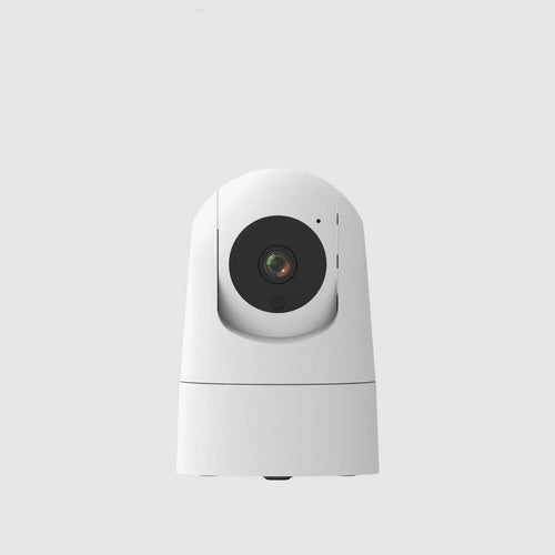 White indoor security camera with wide-angle lens on a table, showing power cable and mounting bracket.