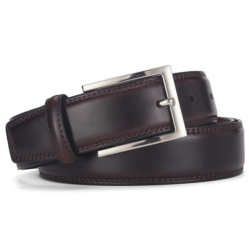 Men's black genuine leather belt with a silver alloy pin buckle shown on a flat surface
