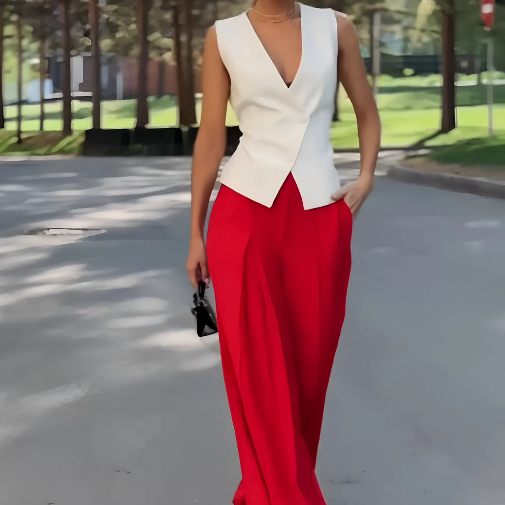 Women's beige polyester two-piece set with sleeveless deep V-neck top and high-waist wide-leg trousers.