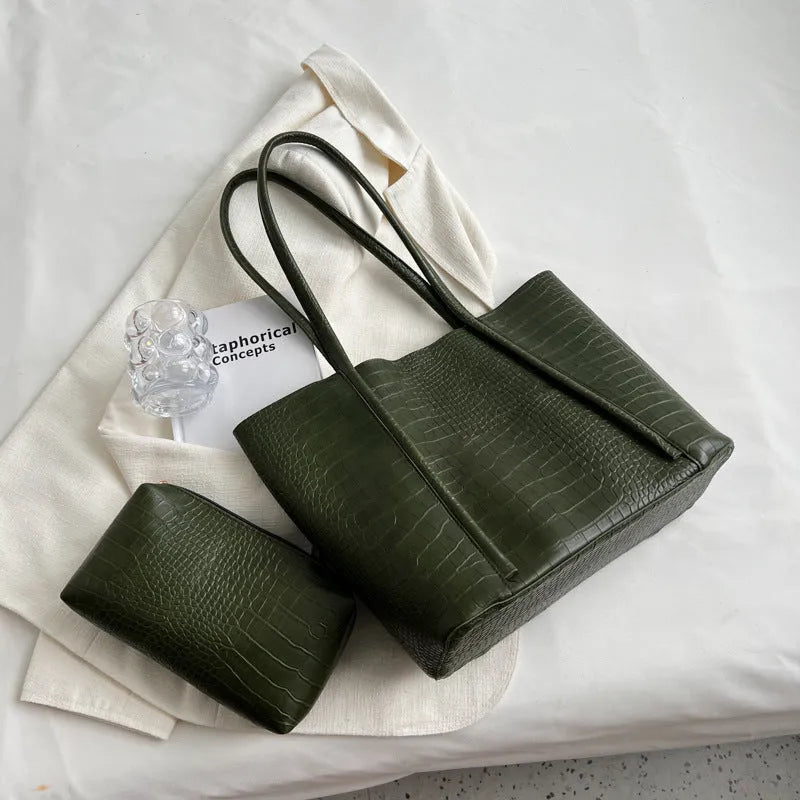 Large capacity PU leather tote bag with embossed texture, soft handle, and horizontal square shape, in black.