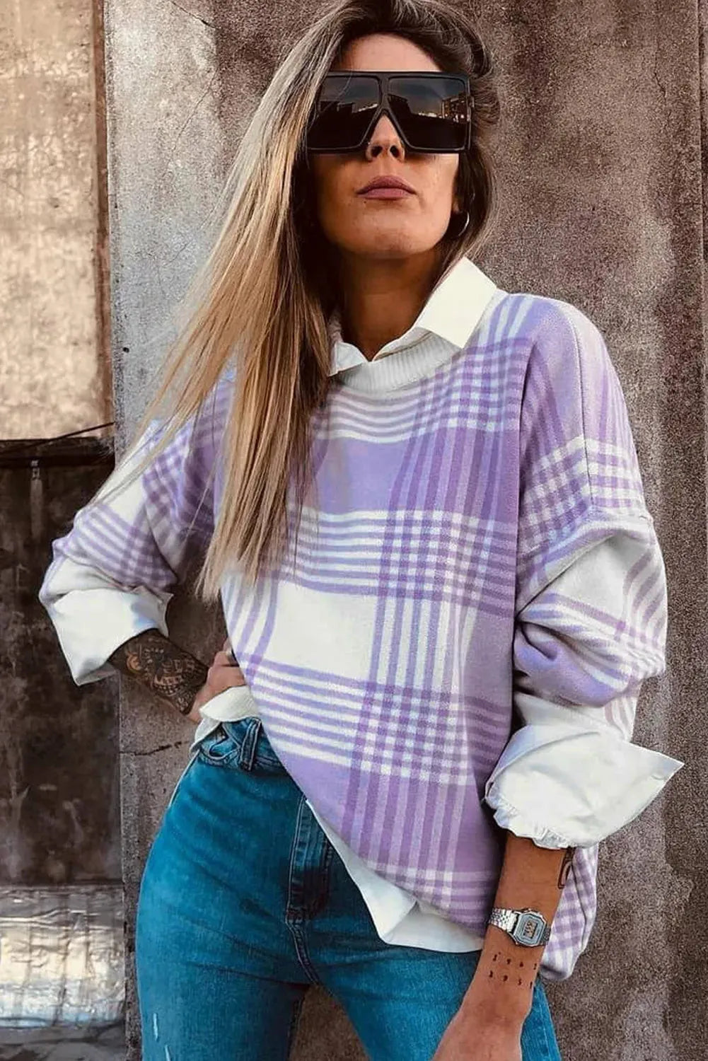 Women's lilac plaid print loose sweater with ribbed trim on cuffs and hem.