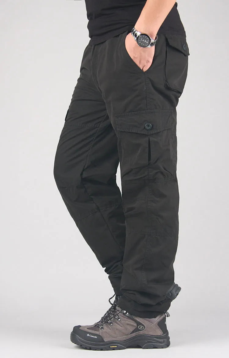 Men's thick khaki cotton overalls with wool lining, showing loose straight-leg fit