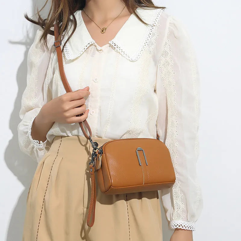 Genuine leather ladies shoulder bag in a horizontal square shape, shown in dark khaki colour.