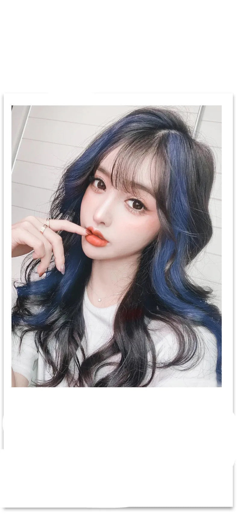 Long curly gradient hair wig patch in clip-in style, showing vibrant colour highlights.