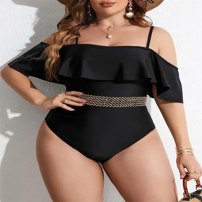 Black women's one-piece swimsuit on a hanger, plus size range 0XL to 4XL.