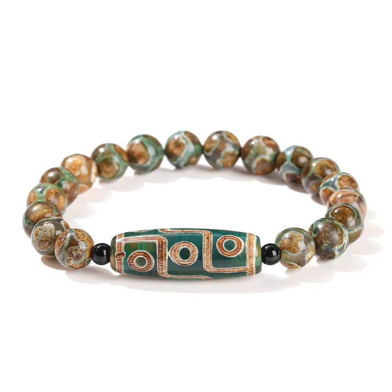 Handmade dzi bead bracelet with 8mm barrel beads in green, unisex geometric design.