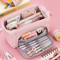 Double canvas multifunctional pencil case shown in seven colours including purple, green, pink and blue.