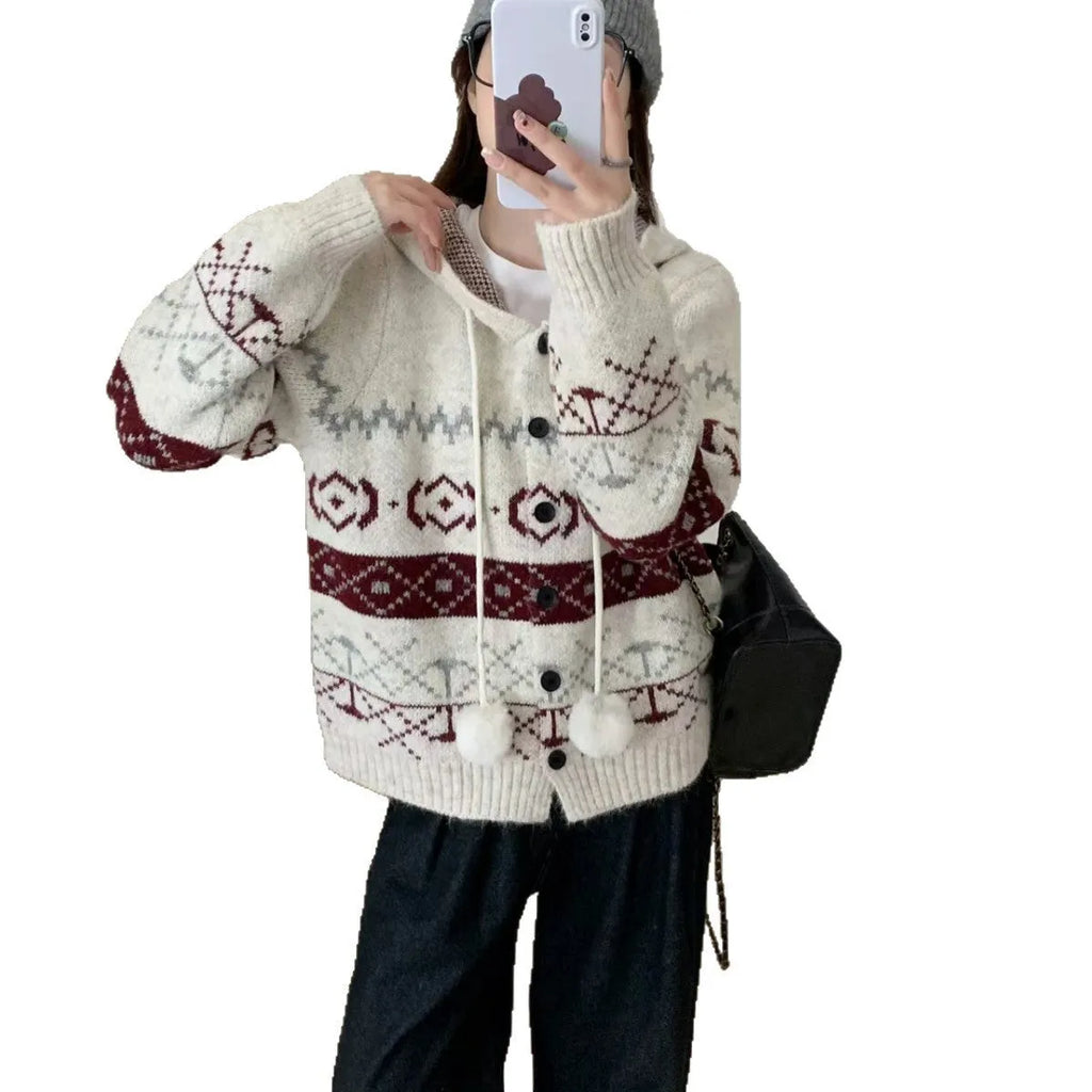 Plus size women's grey geometric pattern brocade knit sweater coat with long sleeves.