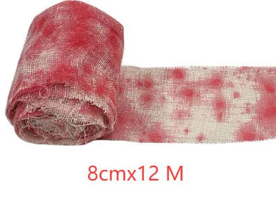 Halloween bloody dyed gauze bandage roll with 8cm width on wooden background