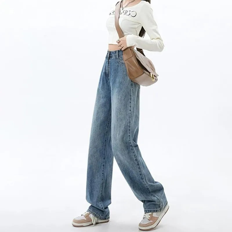 Women's retro blue high-waist wide-leg denim trousers on a hanger, showing straight leg cut.