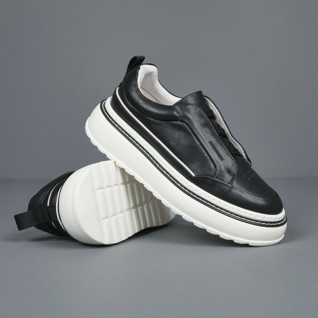 Breathable casual slip-on sneaker with first layer cowhide upper and foam sole, black, side view