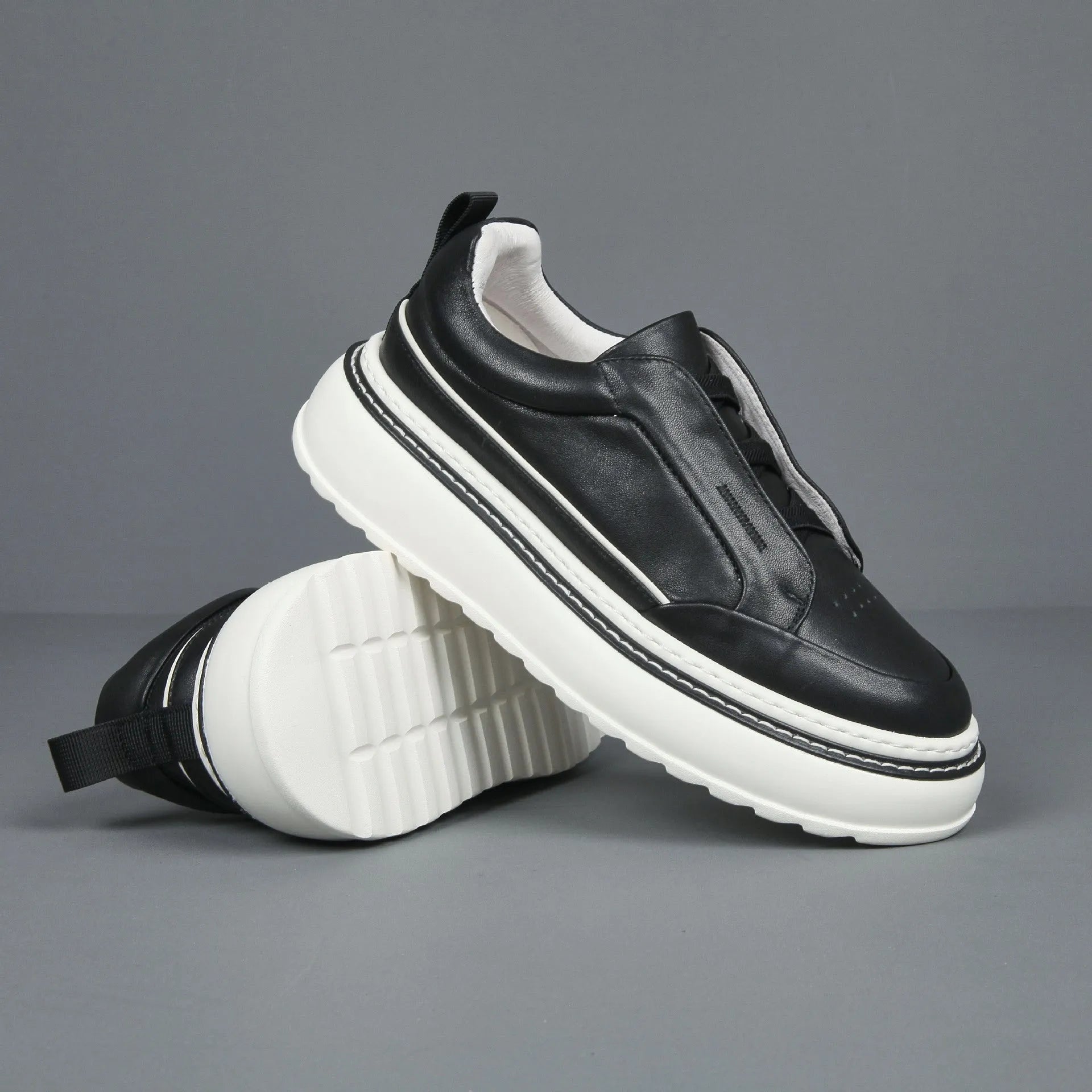 Breathable casual slip-on sneaker with first layer cowhide upper and foam sole, black, side view