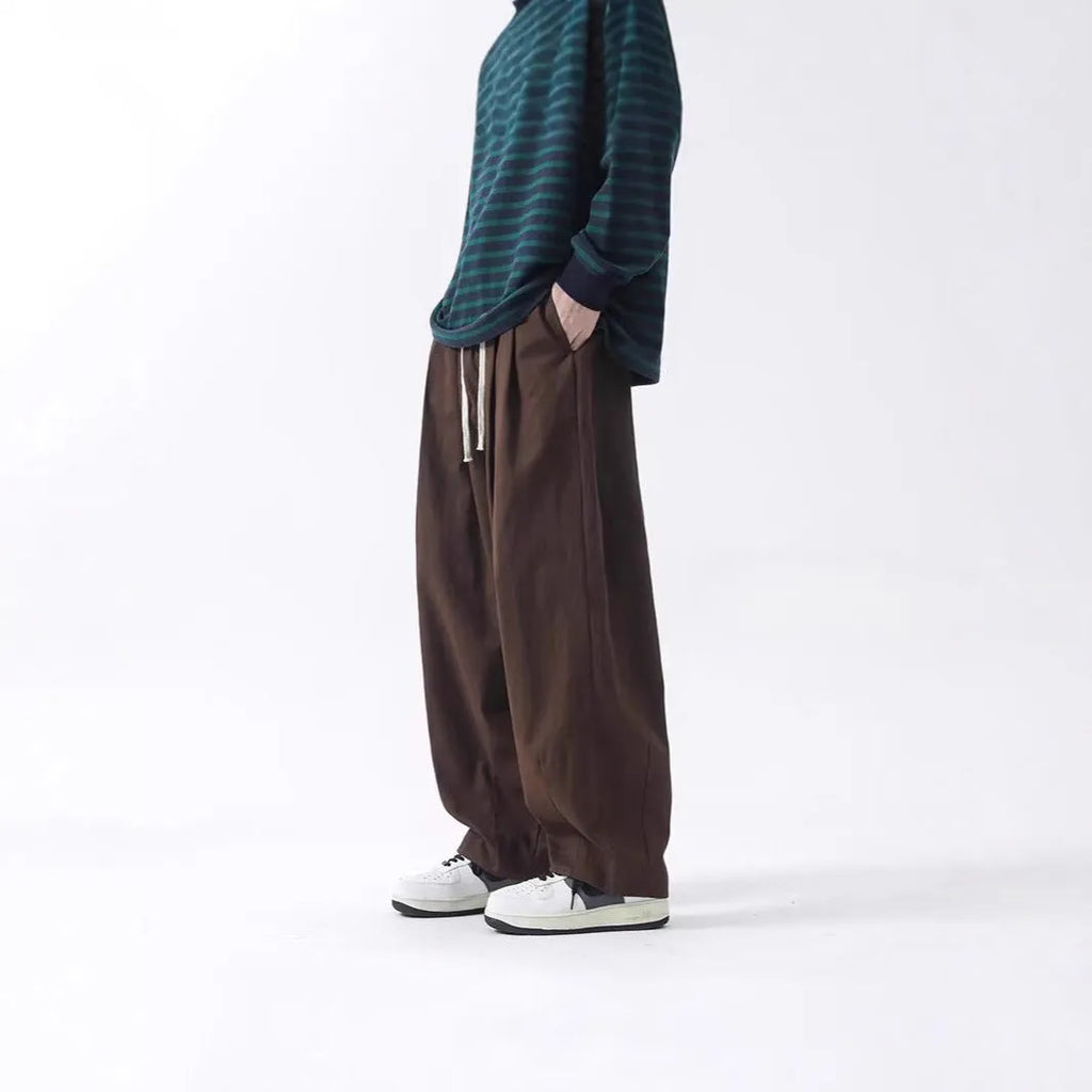 Cotton men's loose wide leg drawstring trousers in black and brown straight leg style with mid waist