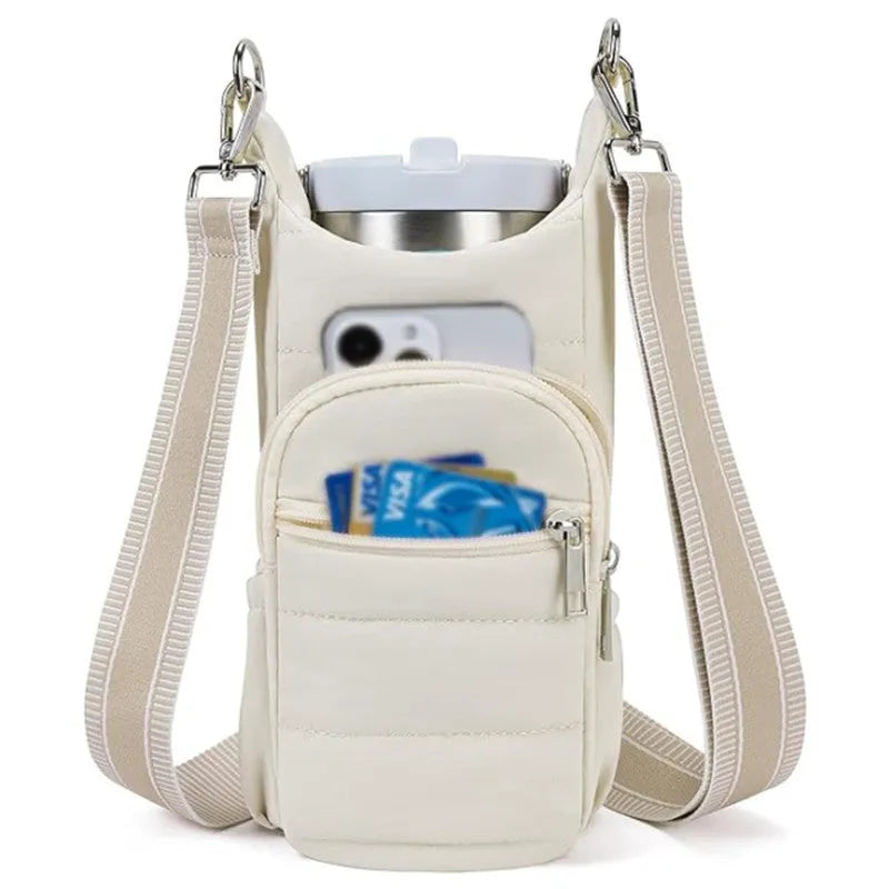 Fabric water bottle kettle bag mounted on bicycle frame in beige colour