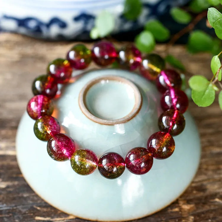 Handmade watermelon crystal bracelet showing natural colouration and bead detailing