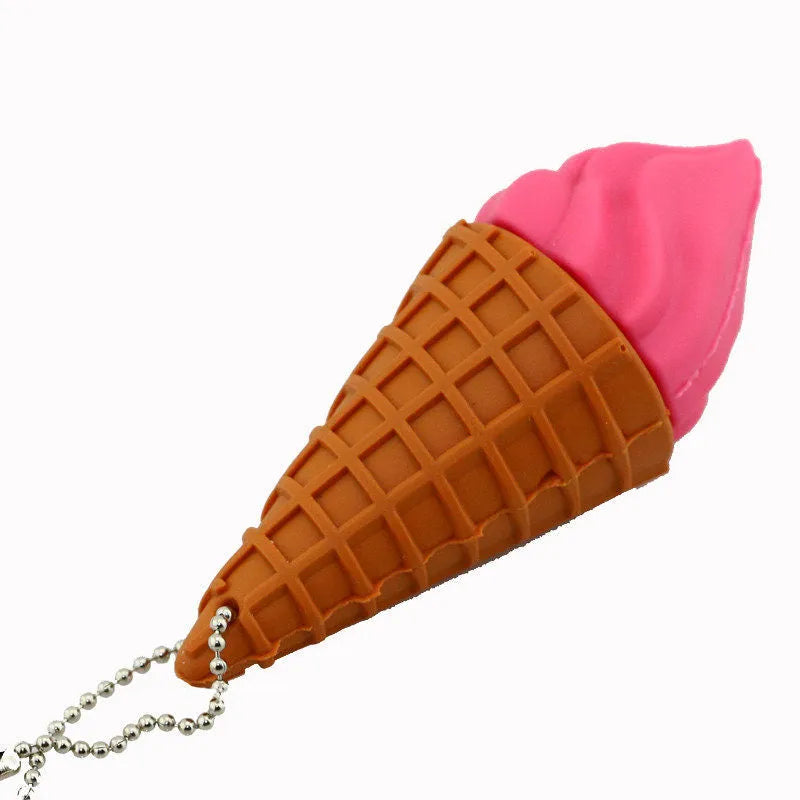Small pink ice cream shaped USB flash drive on a white background