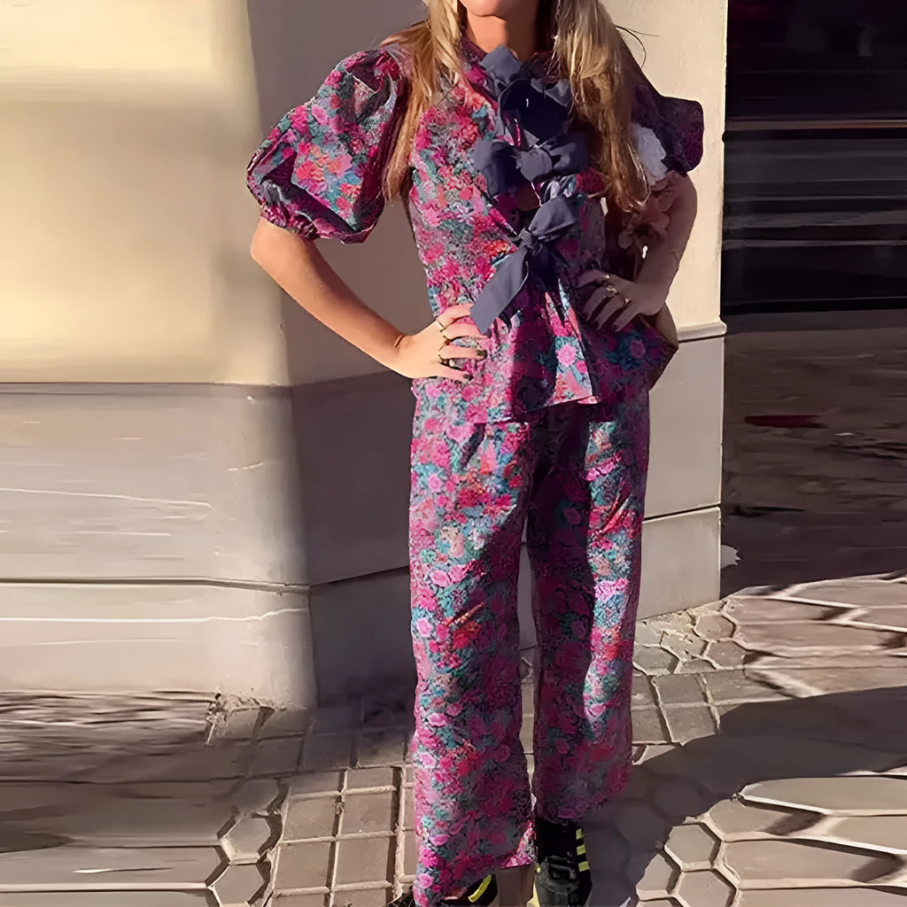 Women's floral print tie-neck long sleeve top with puff sleeves and matching trousers suit set