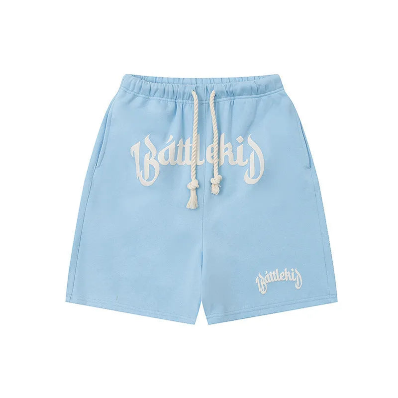 Loose fit black cotton blended hip hop shorts with cropped sweatpants design on a mannequin