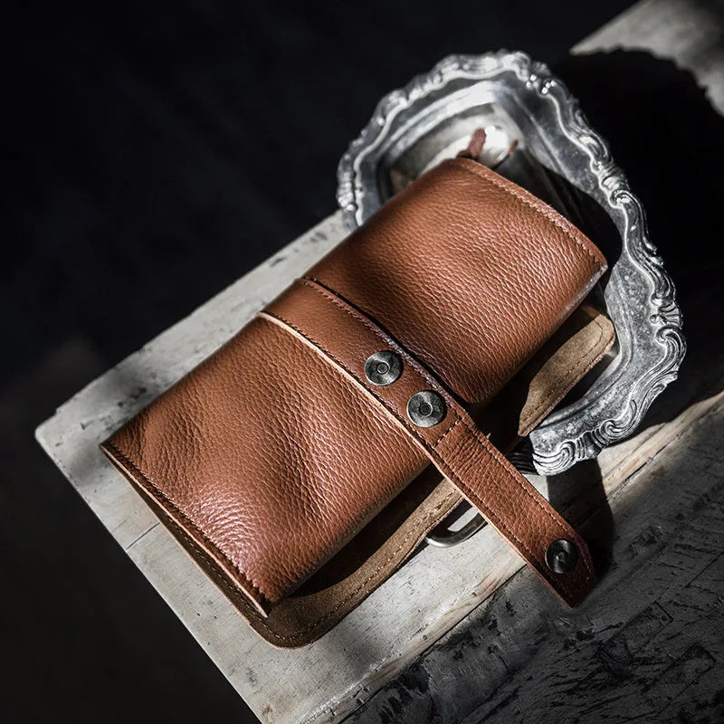 Handmade cow leather vintage wallet with tape closure in black or dark brown colour