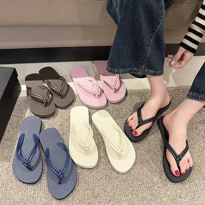 PVC casual flip flops with toe-covering design and injection moulded non-slip soles