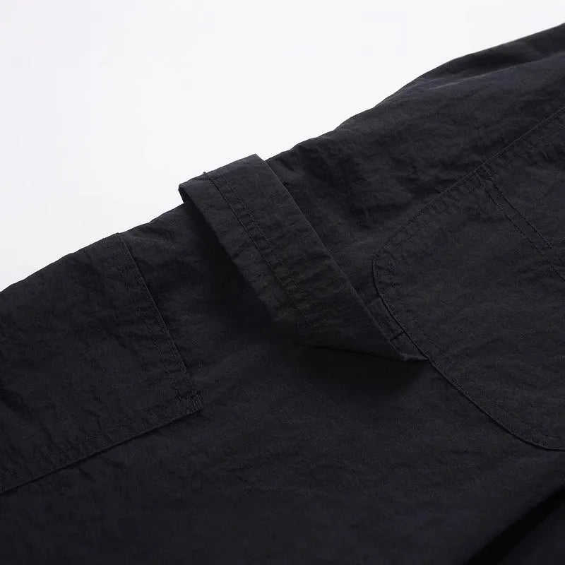Black paratrooper pants with elastic waist and baggy style European American high street cut