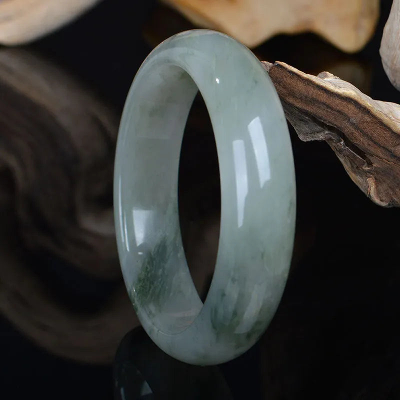 Natural Jinsi Jade Chinese style bracelet showing traditional design with six size options from 52mm to 62mm inner diameter
