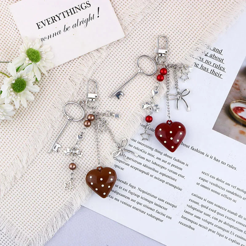 Retro zinc alloy key ring with bow and love heart chain design in multiple colour options