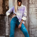 Women's lilac plaid print loose sweater with ribbed trim on cuffs and hem.