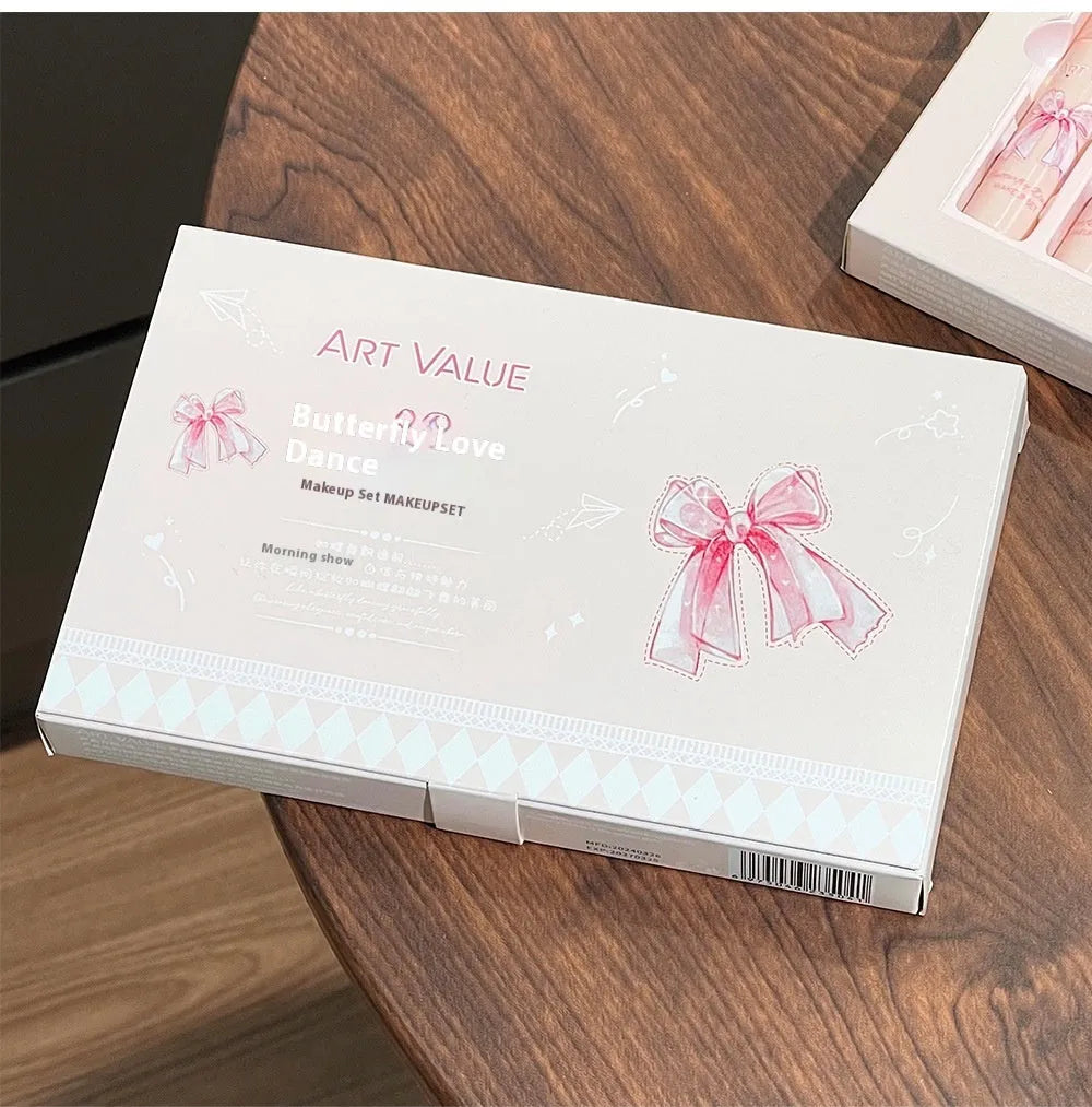 Butterfly Box makeup set showing four matte lip mud tubes and blush compact with chain necklace