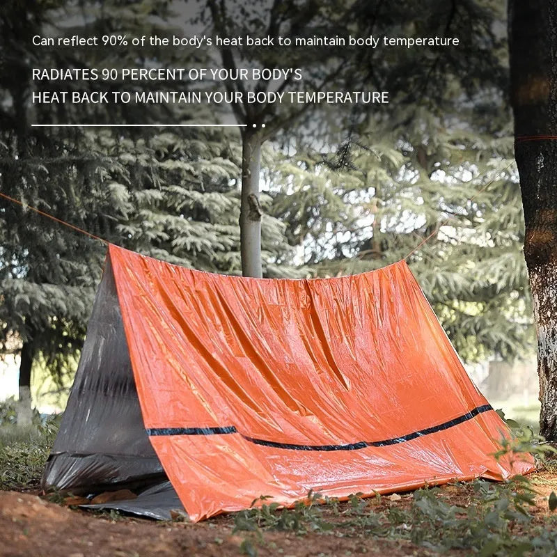 Emergency tent kit with sleeping bag and raincoat components for outdoor survival