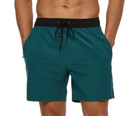 Men's blue stitching waist drawstring running shorts with a zipper pocket on the side.