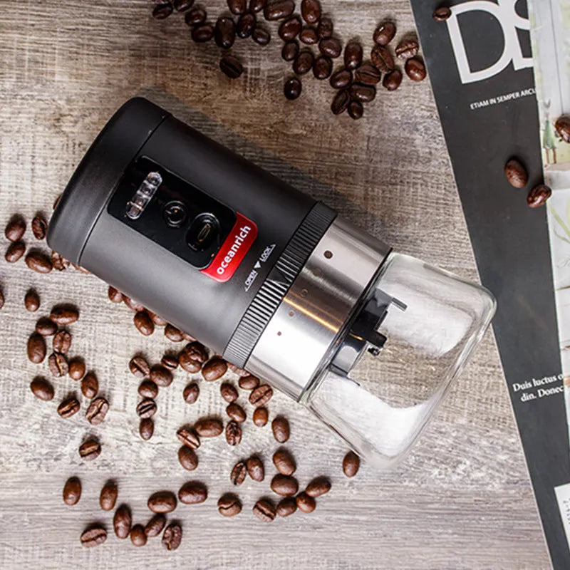 Portable black hand crank coffee grinder with manual operation for travel and home use