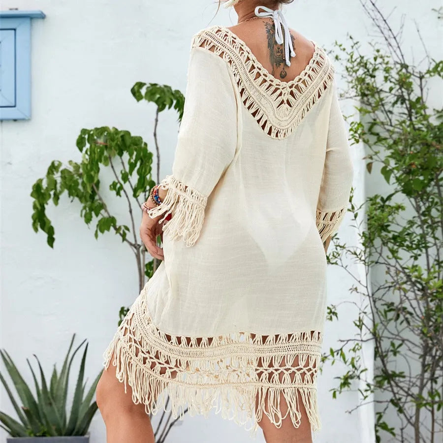 Apricot-coloured women's crocheted patchwork dress with mid-length skirt and half sleeves.