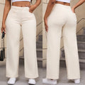 Women's high-waisted wide-leg straight jeans in apricot colour on a model.