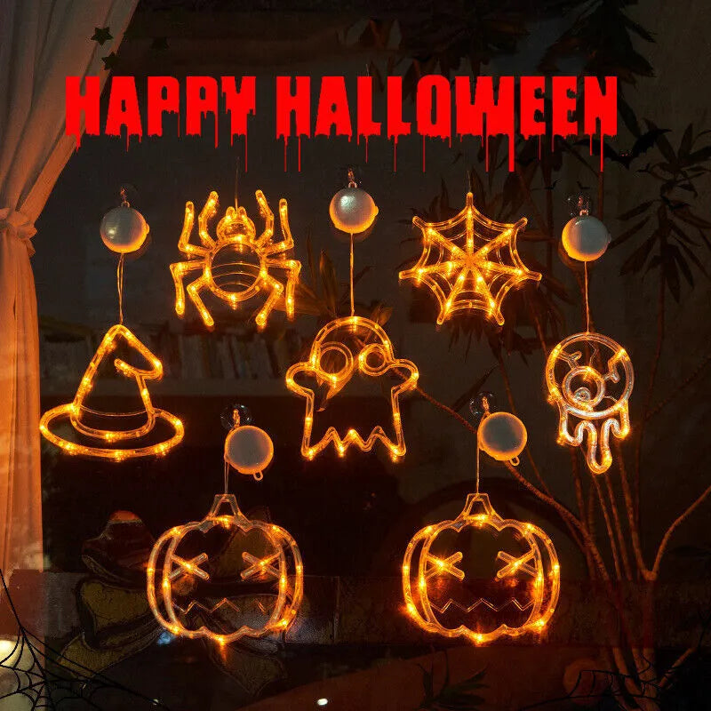 Seven Halloween themed battery-operated LED hanging lights with spider, pumpkin and ghost designs