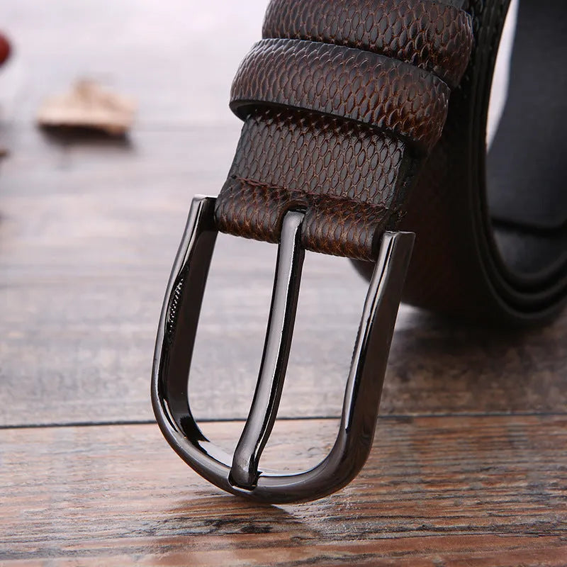 Men's business belt with laser logo detail, alloy pin buckle, and imitation leather strap showing pattern design options