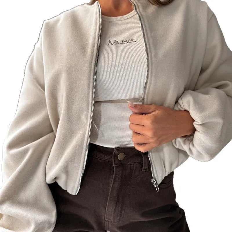 Women's off-shoulder short coat with lantern sleeves in brown colour showing round neck and pocket details