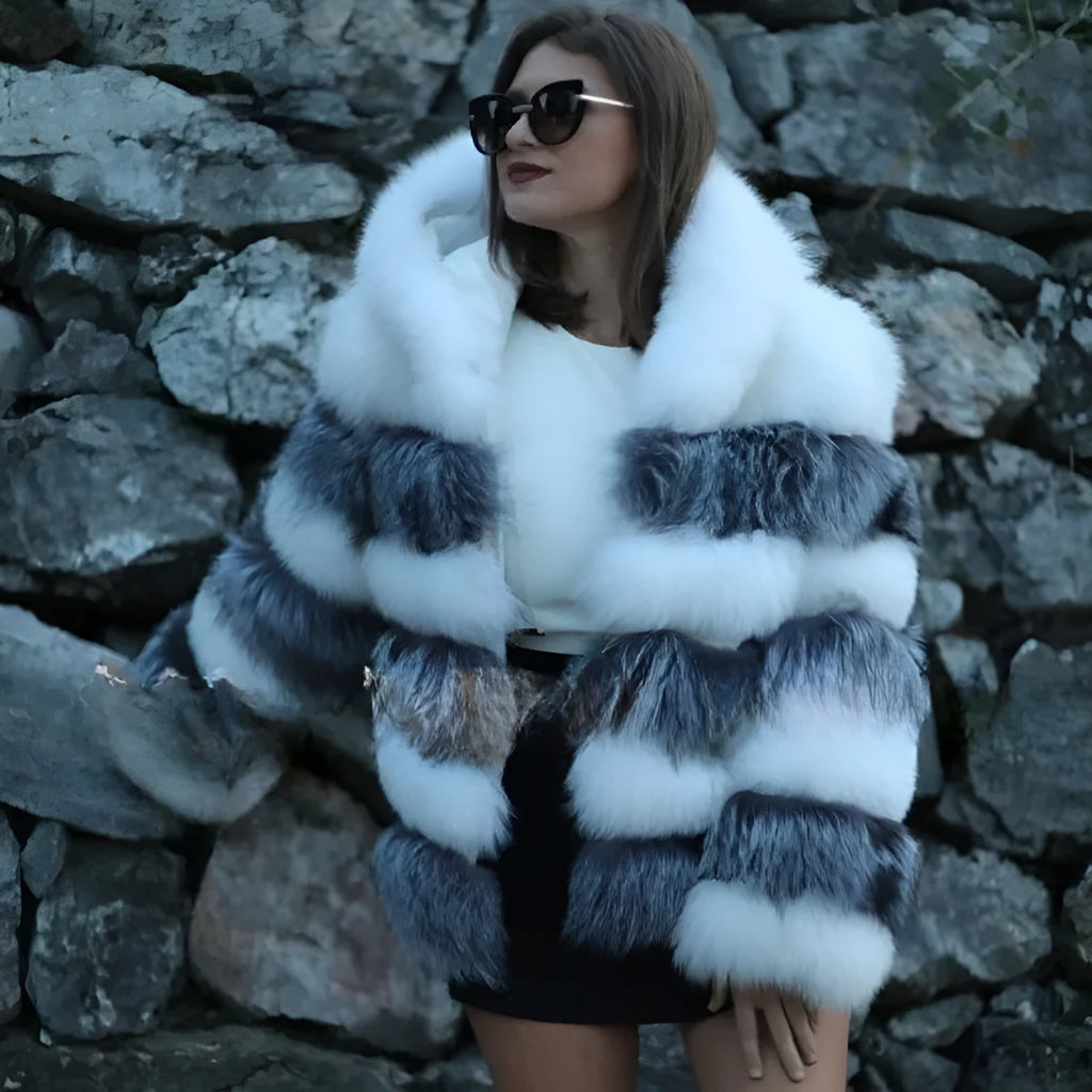 Women's loose brown faux fur hooded coat on a model, street fashion style.