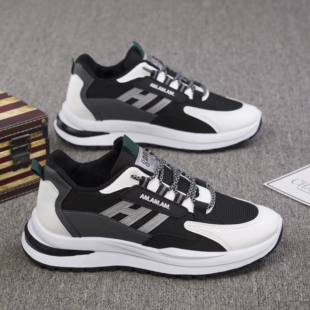Men's grey flying weave mesh running shoes with rubber sole and lace-up front