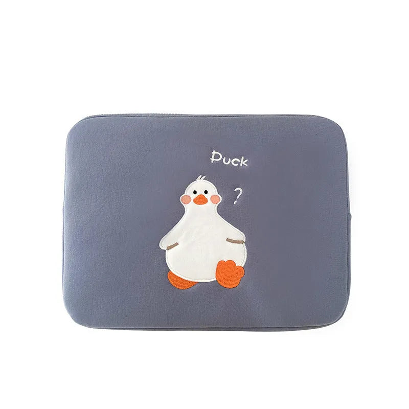 Blue cotton tablet case with a cartoon duck embroidery design and a silver zipper closure.