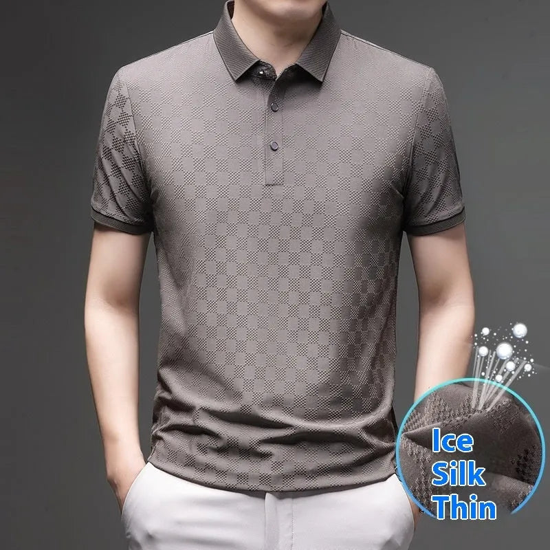 Man wearing a thin black V-neck t-shirt with a rhombus pattern and a side slit detail on the hem.