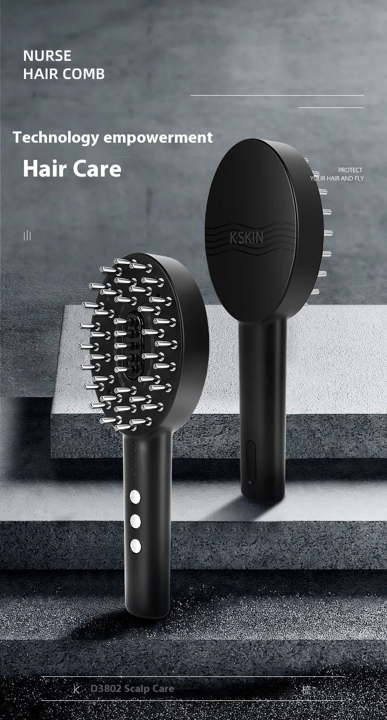 KD3802 Black scalp massage device with charging cable on a table.