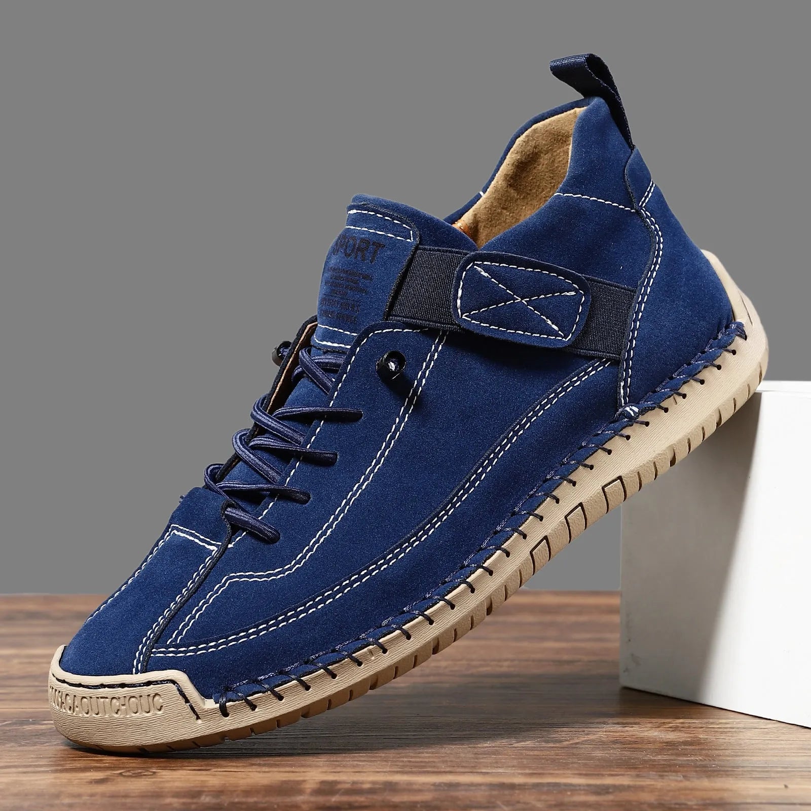 Men's mid-top Martin boots with microfiber upper, leather lining, and rubber sole in solid colour options for winter outdoor wear.