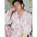 Women's pink floral long sleeve shirt with embossed pattern and loose fit